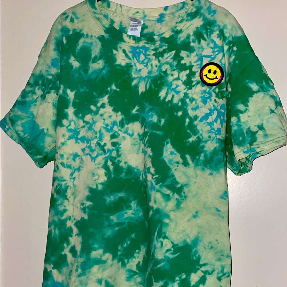 Bleach dyed green t-shirt with smiley patch